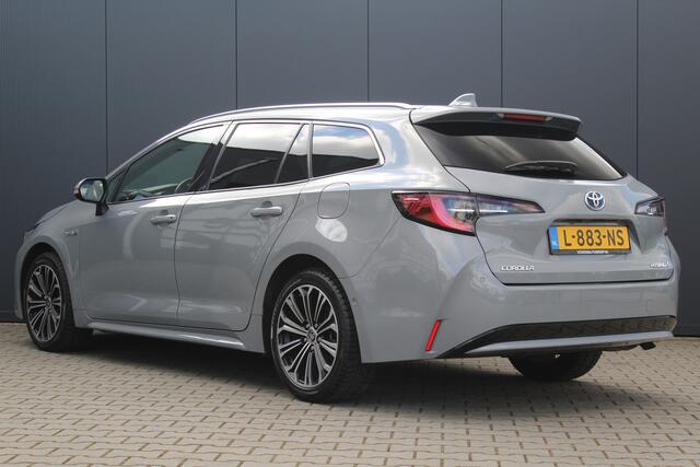 Toyota COROLLA Touring Sports 1.8 Hybrid Executive | incl. 12 maanden garantie | Dodehoek detectie | Camera | Stoelverwarming | Navigatie | Sportstoelen | Zwarte hemel | LED | DAB+ | Draadloze telefoonlader | Climate control | 17" lmv | Parkeersensoren V+A | Head up dis