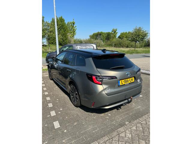 Toyota COROLLA Touring Sports 1.8 Hybrid Bi-Tone Limited, Trekhaak, HUD, Stoelverwarming, Apple carplay, Android Auto, Dealer onderhouden!