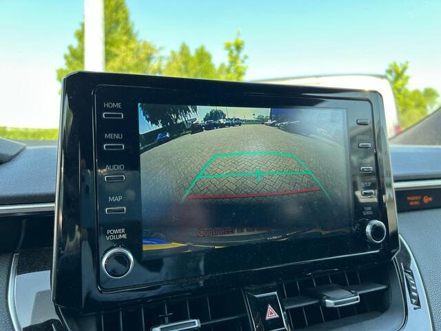 Toyota COROLLA Touring Sports 1.8 Hybrid Bi-Tone Limited, Trekhaak, HUD, Stoelverwarming, Apple carplay, Android Auto, Dealer onderhouden!