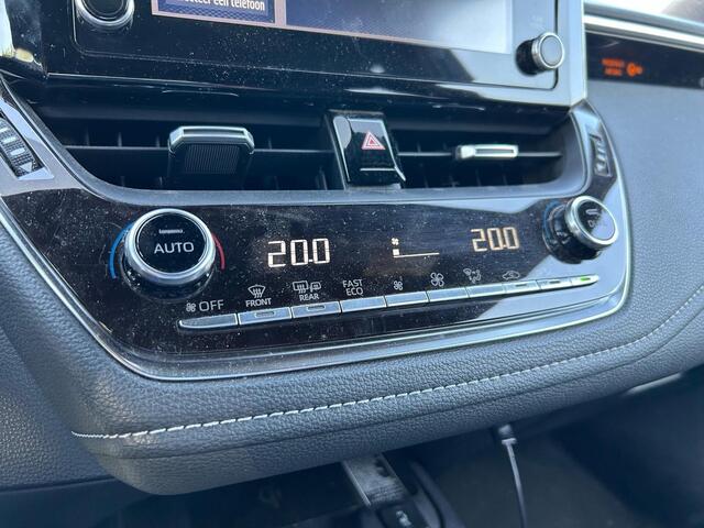 Toyota COROLLA Touring Sports 1.8 Hybrid Bi-Tone Limited, Trekhaak, HUD, Stoelverwarming, Apple carplay, Android Auto, Dealer onderhouden!