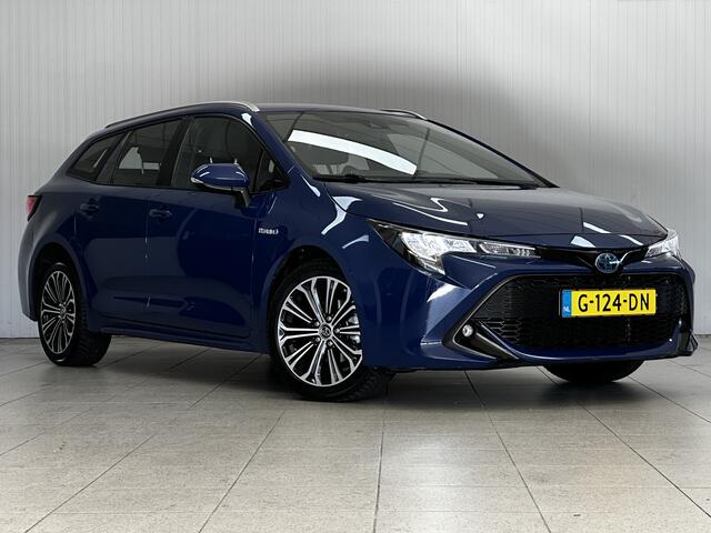 Toyota COROLLA Touring Sports 1.8 Hybrid First Edition/ Automaat/ Trekhaak/ Camera/ Zwarte-Hemel/ LED Koplampen/ Mirror-Link/ 17'' LMV/ Lane-Assist./ Grootlicht Assist./ Navi/ Cruise/ Bluetooth/ Multi. LEDER. Stuur/ LED Mistl./ Dakrails.