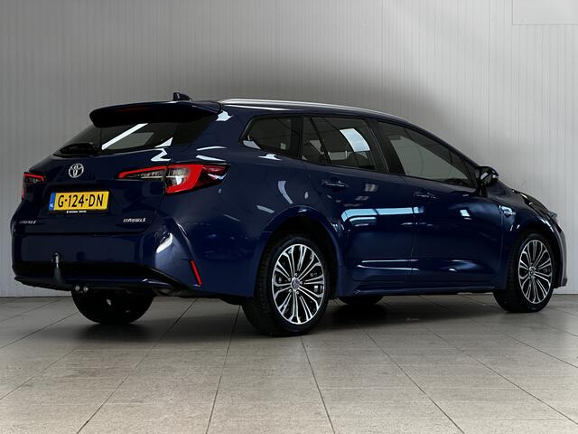 Toyota COROLLA Touring Sports 1.8 Hybrid First Edition/ Automaat/ Trekhaak/ Camera/ Zwarte-Hemel/ LED Koplampen/ Mirror-Link/ 17'' LMV/ Lane-Assist./ Grootlicht Assist./ Navi/ Cruise/ Bluetooth/ Multi. LEDER. Stuur/ LED Mistl./ Dakrails.