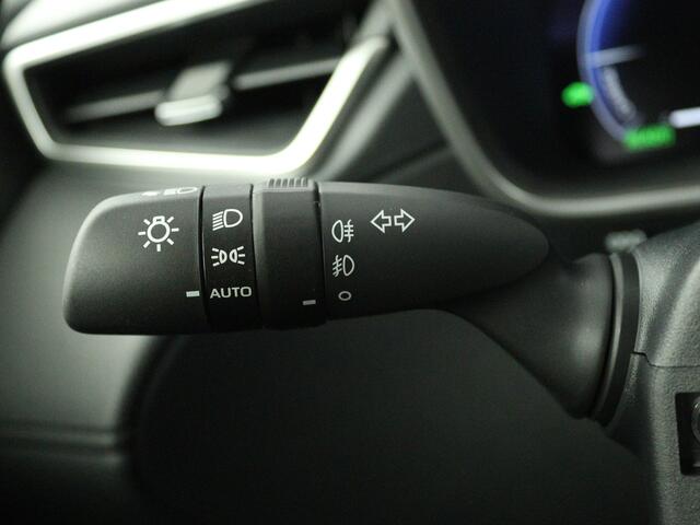 Toyota COROLLA Cross Hybrid 180 Executive | All-season banden | Treeplanken |