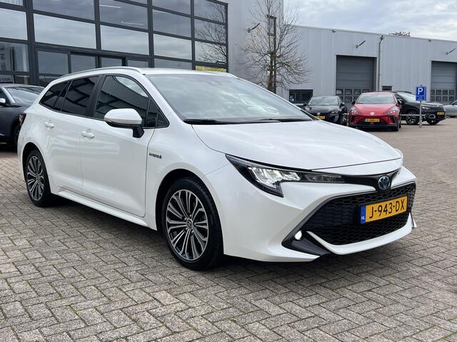 Toyota COROLLA Touring Sports 1.8 Hybrid Business Plus Navigatie* Carplay Camera Keyless Led Stoelverwarming ACC Dab 17 Inch Velgen Getint Glas NL Auto Wit Metallic