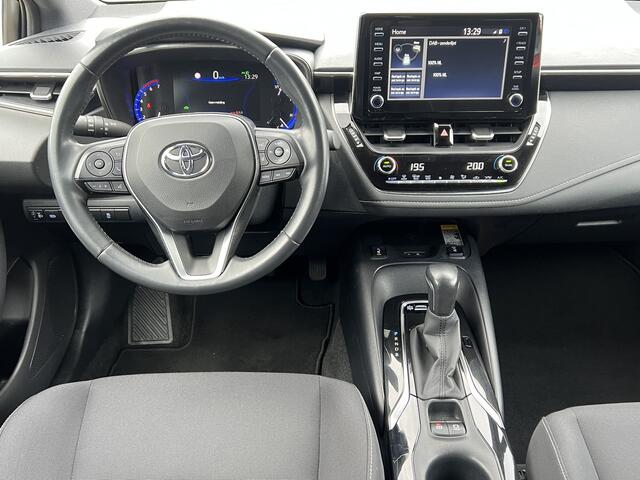 Toyota COROLLA Touring Sports 1.8 Hybrid Business Plus Navigatie* Carplay Camera Keyless Led Stoelverwarming ACC Dab 17 Inch Velgen Getint Glas NL Auto Wit Metallic