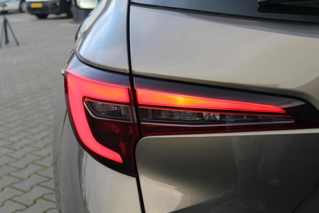 Toyota COROLLA Touring Sports Hybrid 140 Active | Incl. 12 maanden garantie | Achteruitrijcamera | Navigatie | Bluetooth | Cruise control | Climate control | DAB | Lichtmetalen velgen | Airco
