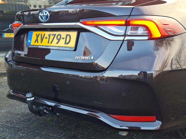 Toyota COROLLA 1.8 Hybrid Executive Sedan | Trekhaak | Blindspot | Adaptive CC | Leder-Stof | Occasion