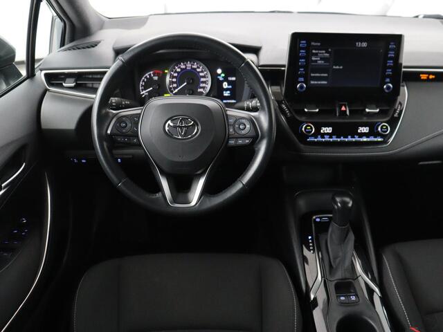 Toyota COROLLA 1.8 Hybrid Business | Trekhaak | Camera | Adaptive cruise | Carplay | Full LED | Climate control | Bluetooth | DAB | Getint glas