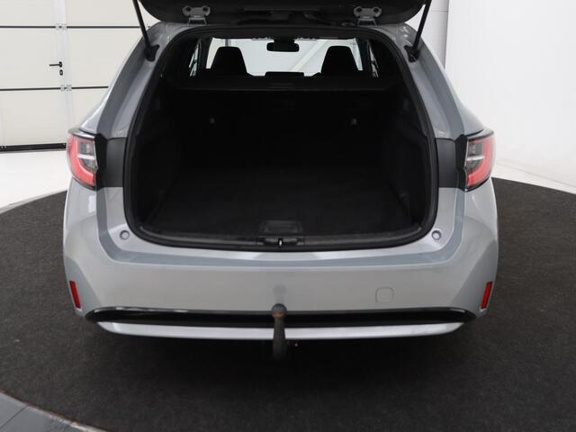 Toyota COROLLA 1.8 Hybrid Business | Trekhaak | Camera | Adaptive cruise | Carplay | Full LED | Climate control | Bluetooth | DAB | Getint glas