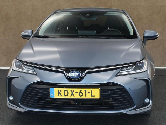 Toyota COROLLA 1.8 Hybrid Active - AFNEEMBARE TREKHAAK - TREKGEWICHT 750 KG - NAVIGATIE - CLIMATE CONTROL - 17 INCH LICHT METALEN VELGEN - KEYLESS ENTRY/ START- CAMERA - ADAPTIEVE CRUISE CONTROL - LENDESTEUN VERSTELLING BESTUURDERSSTOEL - PARKEERSENSOREN VOOR/ ACHTER - 