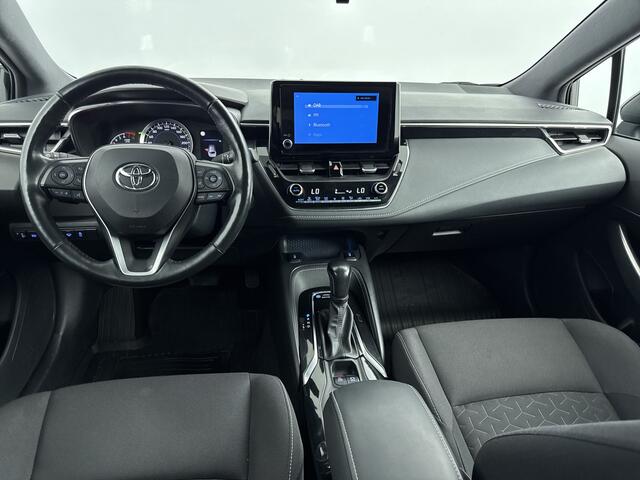 Toyota COROLLA Touring Sports 2.0 Hybrid Active Plus | Trekhaak | Stoel / Stuur Verwarming | Onderweg-naar-dealer