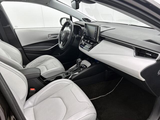 Toyota COROLLA Touring Sports 2.0 Hybrid Premium | Schuif/kantel dak | JBL | Head-Up Display | dodehoek detectie | Stoel+stuurverwarming | Parkeersensoren voor+achter met assistent | Elektrische achterklep |