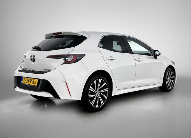 Toyota COROLLA 1.8 Hybrid Dynamic | dealer onderhouden | Stoelverwarming | Draadloze telefoonlader | Climate Control | Cruise Control Adaptive | achteruitrijcamera | Apple CarPlay/Android Auto | LED verlichting |