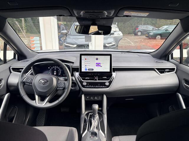 Toyota COROLLA Cross Hybrid 200 Dynamic Navi Fullmap/A.uitrijcamera/In hoogte verst.b. stoel/Airco Automat./Apple Carplay/Cruiscontrole Adapt./Keyless Start/Leder multifunction. stuur/Audio DAB/Elektr. verst.b. en verw. buitenspieg