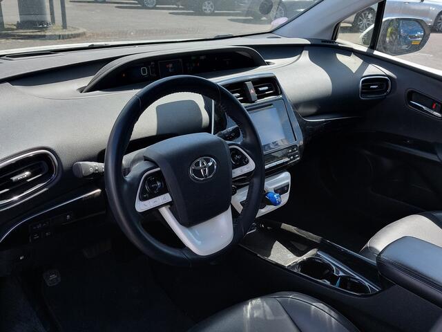 Toyota PRIUS 1.8 Hybrid Black Edition | 1ste Eigenaar | Navi | Clima | Adap.Cruise | Lederen Bekleding | Stoelverwarming | Dodehoek+Rijstrook+Licht+Regensensor | Keyless Entry | Achteruitrijcamera |17''lm
