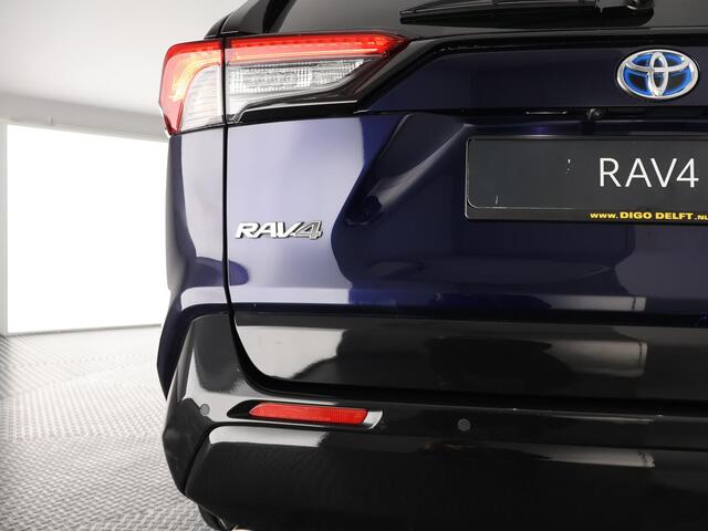 Toyota RAV4 2.5 HYBRID 4WD BUSINESS BLEULINE BI-TONE AWD. NAVI.CARPLAY.PDC.1650 KG TREKGEWICHT. GARANTIE TOT 2030!