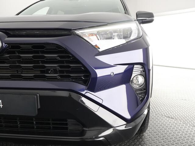 Toyota RAV4 2.5 HYBRID 4WD BUSINESS BLEULINE BI-TONE AWD. NAVI.CARPLAY.PDC.1650 KG TREKGEWICHT. GARANTIE TOT 2030!