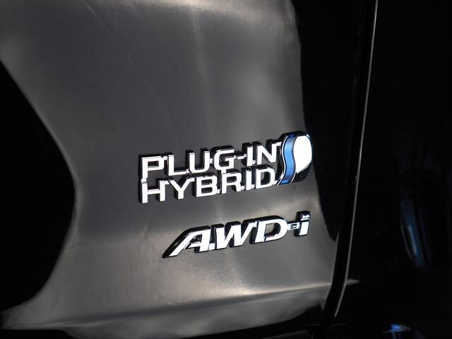 Toyota RAV4 2.5 Plug-in Hybrid AWD Bi-Tone Plus | Dodehoekdetectie | Noodremassistent | Adaptive Cruise Control | Lane Assist | Achteropkomend verkeer waarschuwing | Stuurwiel en Voorstoelen Verwarmd |
