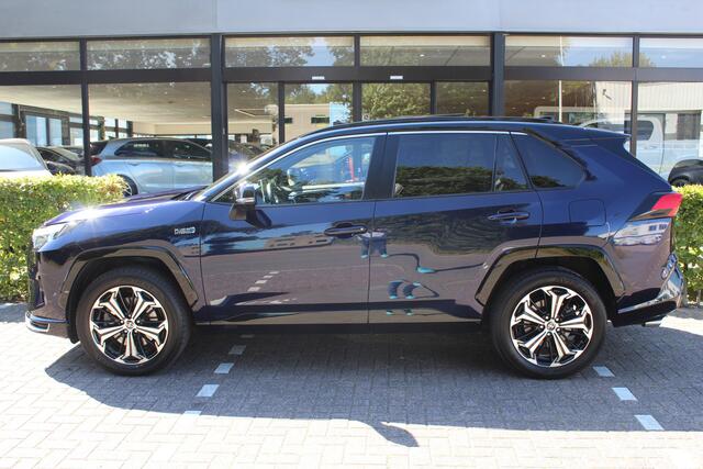 Toyota RAV4 2.5 Plug-in Hybrid AWD Bi-Tone Plus | Rijklaar | Panodak | Trekhaak | Navi | JBL | HUD | Leder | Stoel- koeling/verwarming | 360 Camera | Memory