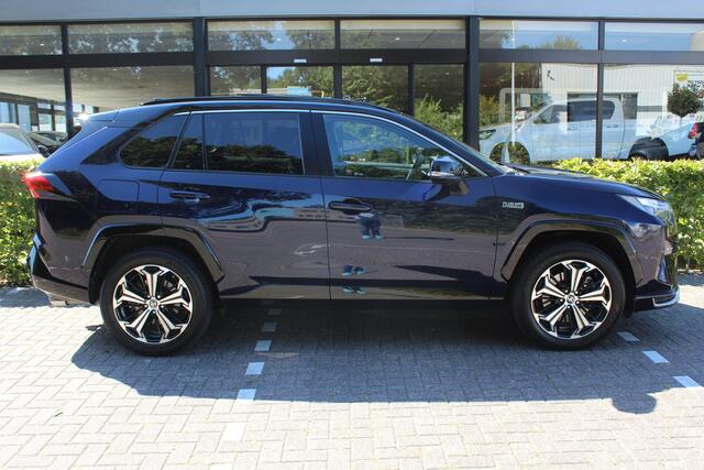 Toyota RAV4 2.5 Plug-in Hybrid AWD Bi-Tone Plus | Rijklaar | Panodak | Trekhaak | Navi | JBL | HUD | Leder | Stoel- koeling/verwarming | 360 Camera | Memory