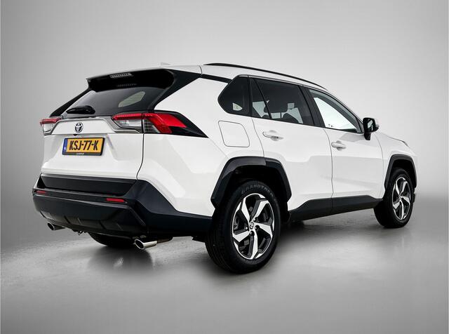 Toyota RAV4 2.5 Plug-in Hybrid AWD Dynamic + | Dodehoek detectie | Head-up Display | Stoel+stuurverwarming | Elektrische Achterklep | Parkeersensoren voor+achter | Draadloze telefoonlader | Navigatie | Apple CarPlay/Android Auto | Cruis