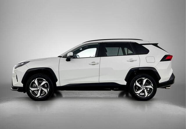 Toyota RAV4 2.5 Plug-in Hybrid AWD Dynamic + | Dodehoek detectie | Head-up Display | Stoel+stuurverwarming | Elektrische Achterklep | Parkeersensoren voor+achter | Draadloze telefoonlader | Navigatie | Apple CarPlay/Android Auto | Cruis