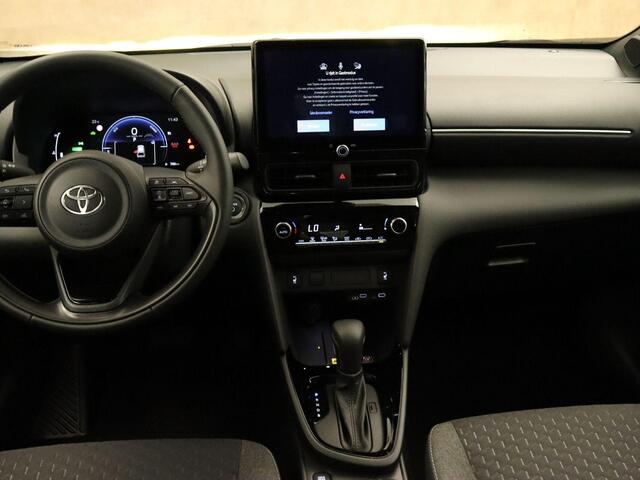 Toyota YARIS Cross 1.5 Hybrid 130 Business Plus - DODEHOEK DETECTIE - 17 INCH LICHT METALEN VELGEN - NAVIGATIE - STUUR-STOEL-VOORRUITVERWARMING - PARKEERSENSOREN VOOR/ ACHTER - KEYLESS ENTRY & START - LICHT EN REGENSENSOR