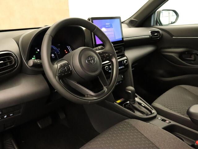 Toyota YARIS Cross 1.5 Hybrid 130 Business Plus - DODEHOEK DETECTIE - 17 INCH LICHT METALEN VELGEN - NAVIGATIE - STUUR-STOEL-VOORRUITVERWARMING - PARKEERSENSOREN VOOR/ ACHTER - KEYLESS ENTRY & START - LICHT EN REGENSENSOR