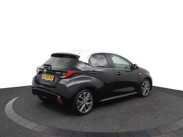 Toyota YARIS 1.5 Hybrid | Bi-tone | leder-stoffen bekleding | 17 inch lichtmetalen velgen |