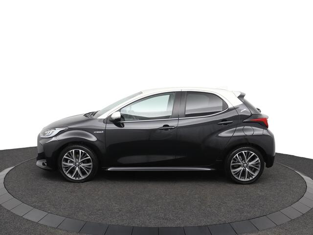Toyota YARIS 1.5 Hybrid | Bi-tone | leder-stoffen bekleding | 17 inch lichtmetalen velgen |