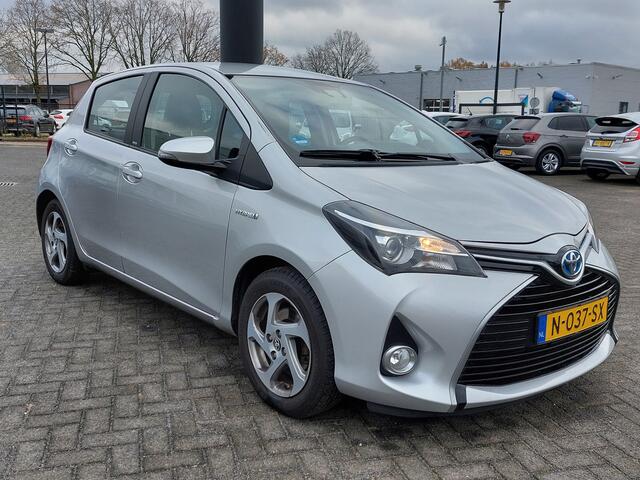 Toyota YARIS 1.5 Hybrid Automaat Trend 5-Deurs | Navi | Clima | Bluetooth Carkit+Streaming | Achteruitrijcamera | Stoelverwarming | Regensensor | Mistlampen | 15''lm