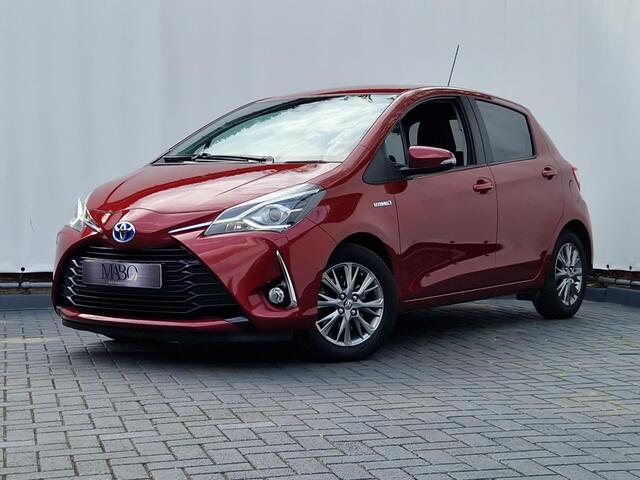 Toyota YARIS 1.5 Hybrid Dynamic | NL Auto | Dealer onderhouden | Camera | Navi | LM Velgen