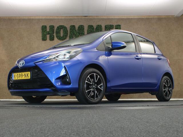 Toyota YARIS 1.5 Hybrid Dynamic - AIRCO AUTOMATISCH - ACHTERUITRIJCAMERA - CRUISE CONTROL - BLUETOOTH TELEFOONVOORBEREIDING - KEYLESS START - LEDEREN STUURWIEL