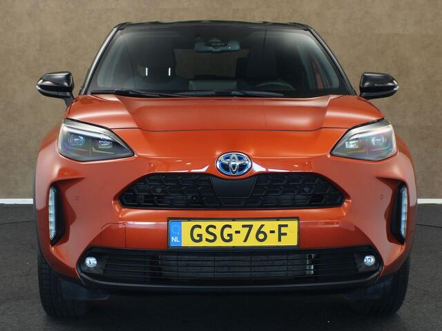 Toyota YARIS Cross 1.5 Hybrid Spicy Edition - DODEHOEK DETECTIE - PARKEERSENSOREN VOOR/ ACHTER - DRAADLOZE TELEFOONLADER - NAVIGATIE - TWON TONE LAK - 4 SEIZOENENBANDEN VREDESTEIN - KEYLESS ENTRY/ START - STOELVERWARMING - STUURVERWARMING - VOORRUITVERWARMING BIJ RUIT