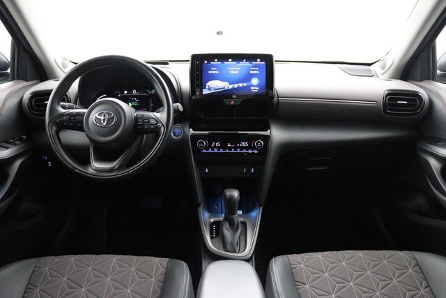 Toyota YARIS Cross 1.5 Hybrid Executive | Leder - Stof bekleding | Dodehoekherkening | Trekhaak | Parkeersensoren |