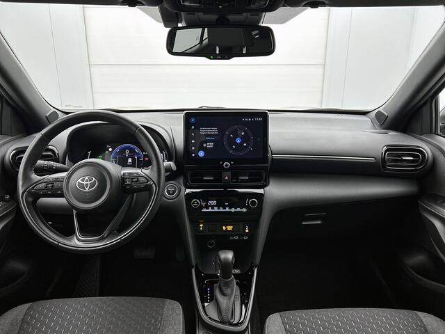 Toyota YARIS Cross 1.5 Hybrid 115 First Edition + | BTW voertuig | Stoel+stuurverwarming | Draadloze telefoonlader | Navigatie | Apple CarPlay/Android Auto | Climate Control | Cruise Control Adaptive | Achteruitrijcamera |