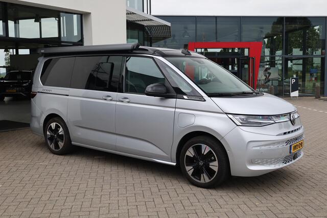 Volkswagen CALIFORNIA 180KW-245PK, Hybride, Camper, Standkachel, Keuken met Koelkast, gaspit, stromend water, 230V, elektrisch hef dak, Luifel, slaapmogelijkheid 2 persoon bed, 4 zitplaatsen, watertank, handdouche, vele opberg mogelijkheden,