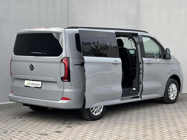 Volkswagen E-Transporter Caravelle 32 L1H1 Life 64 kWh Automaat / NIEUW/ Fabrieksgarantie tot 12-2027 / 8 Persoons / Stone Gray / Warmtepomp / Apple Carplay/Android Auto / Licht en zicht-pakket / Keyless entry / draadloze telefoonlader /