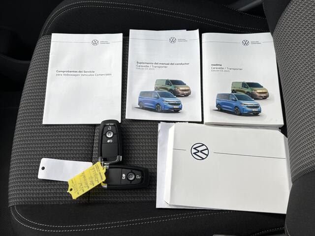 Volkswagen E-Transporter Caravelle 32 L1H1 Life 64 kWh Automaat / NIEUW/ Fabrieksgarantie tot 12-2027 / 8 Persoons / Stone Gray / Warmtepomp / Apple Carplay/Android Auto / Licht en zicht-pakket / Keyless entry / draadloze telefoonlader /