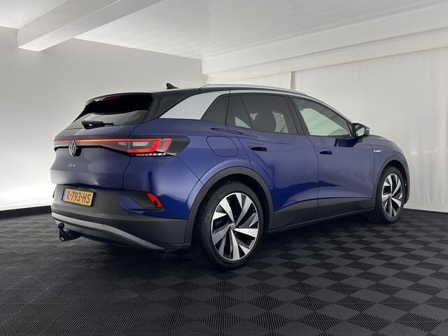 Volkswagen ID.4 First 77 kWh [ 3-Fase ] {SOH-83%} (INCL.BTW) *LEATHER-MICROFIBRE | FULL-LED | ADAPTIVE-CRUISE | HEATED-COMFORTSEATS | DIGI-COCKPIT | AMBIENT-LIGHT | NAVI-FULLMAP | PDC | TOWBAR | PRIVACY-GLASS | CAMERA | 20''ALU*