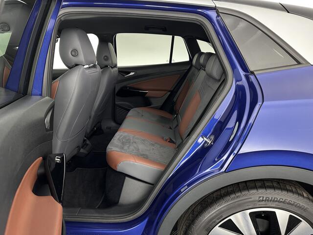 Volkswagen ID.4 First 77 kWh [ 3-Fase ] {SOH-83%} (INCL.BTW) *LEATHER-MICROFIBRE | FULL-LED | ADAPTIVE-CRUISE | HEATED-COMFORTSEATS | DIGI-COCKPIT | AMBIENT-LIGHT | NAVI-FULLMAP | PDC | TOWBAR | PRIVACY-GLASS | CAMERA | 20''ALU*