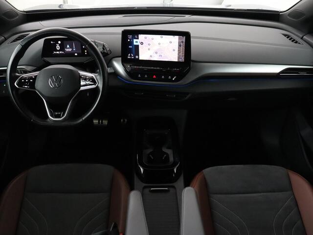 Volkswagen ID.4 First 77 kWh | Trekhaak | Stoel & stuurverwarming | Adaptive cruise | Camera | Carplay | Half leder | Navigatie | 20'' | Full LED | Keyless | Climate control | Sfeerverlichting