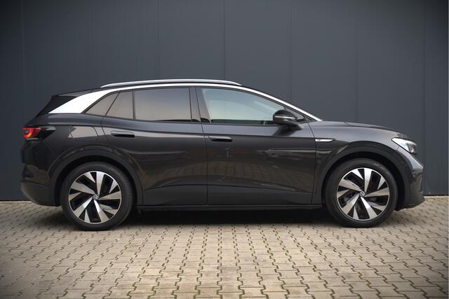 Volkswagen ID.4 First 77 kWh | Stoelverwarming | Stuurverwarming | Trekhaak | Warmtepomp | Adaptive Cruise Control | Navigatie | Apple Carplay | Keyless | Camera | Parkersensoren |