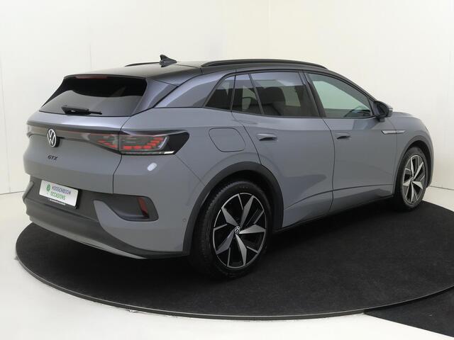 Volkswagen ID.4 GTX 4Motion 77 kWh | SoH 92% | Panoramadak | 360 camera | Dodehoek detectie | Keyless | Adaptieve cruise control | CarPlay | Parkeerassistent | Stoel- en stuurwielverwarming |
