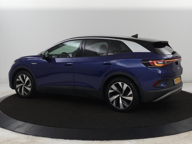 Volkswagen ID.4 First 77 kWh | SOH 90% | Stoel & stuurverwarming | Adaptive cruise | Camera | Carplay | Half leder | Navigatie | 20'' | Full LED | Keyless | Climate control | Sfeerverlichting