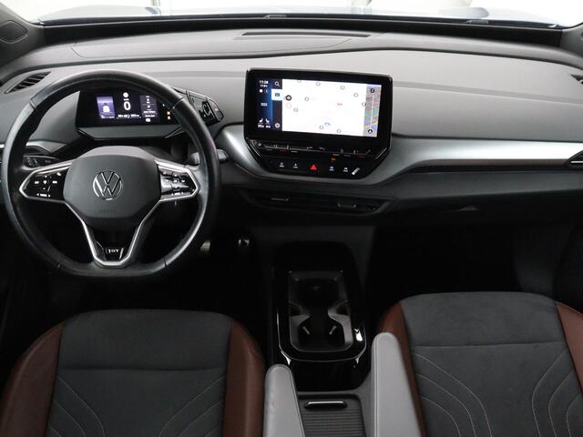 Volkswagen ID.4 First 77 kWh | SOH 90% | Stoel & stuurverwarming | Adaptive cruise | Camera | Carplay | Half leder | Navigatie | 20'' | Full LED | Keyless | Climate control | Sfeerverlichting
