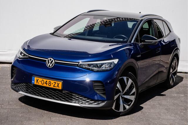 Volkswagen ID.4 First Pro 77 kWh SOH 89% Trekhaak/ Stoel-stuurverwarming/ Camera/ Navigatie/ Carplay/ Sfeerverlichting/ Full led/ 20" Lmv