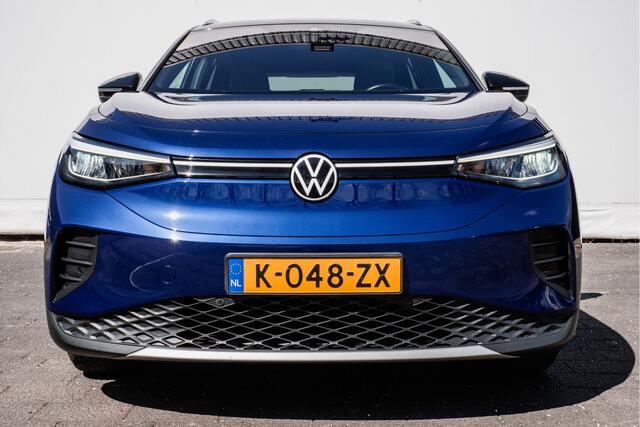 Volkswagen ID.4 First Pro 77 kWh SOH 89% Trekhaak/ Stoel-stuurverwarming/ Camera/ Navigatie/ Carplay/ Sfeerverlichting/ Full led/ 20" Lmv