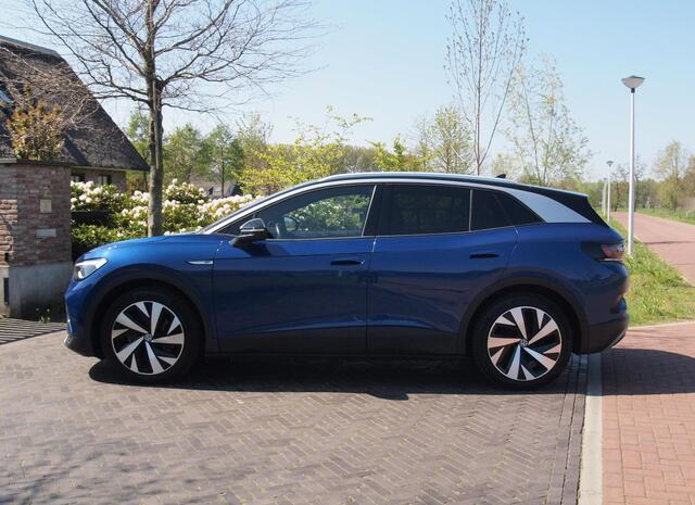 Volkswagen ID.4 First 77 kWh | Camera | Trekhaak | Sfeerverlichting | Apple Carplay | Cruise Control |