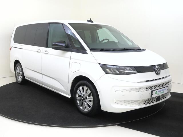 Volkswagen MULTIVAN 1.4 eHybrid L2 Style 6 versnellingen DSG | SoH 94% | 7p | Parkeerassistent | Stoelverwarming | Achteruitrijcamera | Navigatie | 3-zone airco | CarPlay |